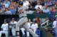 KANSAS CITY, MO - JULY 11: Miguel Cabrera #24 of the Detroit Tigers hits a sacrifice fly in the third inning against the Kansas City Royals at Kauffman Stadium on July 11, 2014 at Kauffman Stadium in Kansas City, Missouri. (Photo by Ed Zurga/Getty Images)