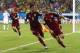 CUIABA, BRAZIL - JUNE 17: Aleksandr Kerzhakov of Russia (R) celebrates scoring his team's first goal with Alexander Samedov during the 2014 FIFA World Cup Brazil Group H match between Russia and South Korea at Arena Pantanal on June 17, 2014 in Cuiaba, Br