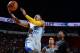 LAS VEGAS, NV - JULY 22: Kent Bazemore #20 of the Golden State Warriors goes up for the layup against the Phoenix Suns during NBA Summer League Championship Game on July 22, 2013 at the Cox Pavilion in Las Vegas, Nevada. NOTE TO USER: User expressly ackno
