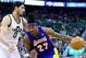 Apr 14, 2014; Salt Lake City, UT, USA; Los Angeles Lakers forward Jordan Hill (27) drives against Utah Jazz center Enes Kanter (0) during the first quarter at EnergySolutions Arena. Mandatory Credit: Russ Isabella-USA TODAY Sports
