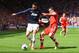 SOUTHAMPTON, ENGLAND - MAY 11: Chris Smalling (L) of Manchester United holds off Dejan Lovren (R) of Southampton during the Barclays Premier League match between Southampton and Manchester United at St Mary's Stadium on May 11, 2014 in Southampton, Engla