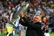 LISBON, PORTUGAL - MAY 24: Head Coach, Carlo Ancelotti of Real Madrid celebrates with the Champions League trophy during the UEFA Champions League Final between Real Madrid and Atletico de Madrid at Estadio da Luz on May 24, 2014 in Lisbon, Portugal. (P