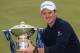 ABERDEEN, SCOTLAND - JULY 13: Justin Rose of England poses with the trophy after winning the Aberdeen Asset Management Scottish Open at Royal Aberdeen on July 13, 2014 in Aberdeen, Scotland. (Photo by Andrew Redington/Getty Images)