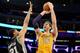 LOS ANGELES, CA - MARCH 19: Pau Gasol #16 of the Los Angeles Lakers shoots against Tim Duncan #21 of the San Antonio Spurs at Staples Center on March 19, 2014 in Los Angeles, California. NOTE TO USER: User expressly acknowledges and agrees that, by downlo