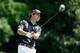 SILVIS, IL - JULY 13: Brian Harman tees off on the 13th hole during the final round of the John Deere Classic held at TPC Deere Run on July 13, 2014 in Silvis, Illinois. (Photo by Gregory Shamus/Getty Images)