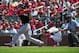 Jul 6, 2014; St. Louis, MO, USA; Miami Marlins right fielder Giancarlo Stanton (27) hits a single off of St. Louis Cardinals relief pitcher Jason Motte (not pictured) during the eighth inning at Busch Stadium. Marlins defeated the Cardinals 8-4. Mandatory