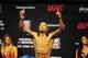 Apr 18, 2014; Orlando, FL, USA; Edson Barboza poses on the scale during a weigh-in for his lightweight fight against Donald Cerrone for UFC on FOX 11 at Amway Center. Mandatory Credit: David Manning-USA TODAY Sports