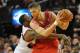 PORTLAND, OR - APRIL 27: Wesley Matthews #2 of the Portland Trail Blazers reaches in on Chandler Parsons #25 of the Houston Rockets in the fourth quarter of Game Four of the Western Conference Quarterfinals during the 2014 NBA Playoffs at the Moda Center