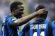 MILAN, ITALY - APRIL 24: Mcdonald Mariga of FC Internazionale Milano celebrates scoring his team's second goal with team mate Sulley Ali Muntari during the Serie A match between FC Internazionale Milano and Atalanta BC at Stadio Giuseppe Meazza on April