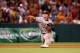 ANAHEIM, CA - JUNE 11: Third baseman Josh Donaldson #20 of the Oakland Athletics throws to first but can't get Howie Kendrick of the Los Angeles Angels of Anaheim in the eighth inning at Angel Stadium of Anaheim on June 11, 2014 in Anaheim, California.