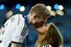 RIO DE JANEIRO, BRAZIL - JULY 13: Andre Schuerrle of Germany celebrates with girlfriend Montana Yorke after defeating Argentina 1-0 in extra time during the 2014 FIFA World Cup Brazil Final match between Germany and Argentina at Maracana on July 13, 2014