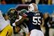 ATLANTA, GA - DECEMBER 07: Carl Lawson #55 of the Auburn Tigers tackles quarterback James Franklin #1 of the Missouri Tigers in the second quarter during the SEC Championship Game at Georgia Dome on December 7, 2013 in Atlanta, Georgia. (Photo by Kevin