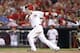 CINCINNATI, OH - JULY 12: Todd Frazier #21 of the Cincinnati Reds hits a three-run home run in the sixth inning of the game against the Pittsburgh Pirates at Great American Ball Park on July 12, 2014 in Cincinnati, Ohio. The Pirates won 6-5 in 11 innings.