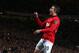 MANCHESTER, ENGLAND - MAY 06: Robin van Persie of Manchester United celebrates scoring his team's third goal during the Barclays Premier League match between Manchester United and Hull City at Old Trafford on May 6, 2014 in Manchester, England. (Photo b