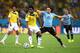 RIO DE JANEIRO, BRAZIL - JUNE 28: Edinson Cavani of Uruguay battles with Carlos Sanchez of Colombia during the 2014 FIFA World Cup Brazil round of 16 match between Colombia and Uruguay at Maracana on June 28, 2014 in Rio de Janeiro, Brazil. (Photo by Jul