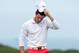 ABERDEEN, SCOTLAND - JULY 12 : Rory McIlroy of Northern Ireland reacts on the 18th green during the Aberdeen Asset Management Scottish Open third round at Royal Aberdeen Golf Club on July 12, 2014 in Aberdeen, Scotland (Photo by Mark Runnacles/Getty Image