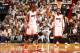 MIAMI, FL - MAY 6: Chris Bosh #1 and Dwyane Wade #3 of the Miami Heat celebrates in Game One of the Eastern Conference Semi-Finals against the Brooklyn Nets during the 2014 NBA Playoffs at American Airlines Arena on May 6, 2014 in Miami, Florida. NOTE TO
