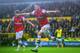NORWICH, ENGLAND - MAY 11: Carl Jenkinson of Arsenal celebrates scoring the second goal during the Barclays Premier League match between Norwich City and Arsenal at Carrow Road on May 11, 2014 in Norwich, England. (Photo by Jamie McDonald/Getty Images)