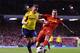 LIVERPOOL, ENGLAND - MARCH 26: Daniel Agger of Liverpool challenges Emanuele Giaccherini of Sunderland during the Barclays Premier League match between Liverpool and Sunderland at Anfield on March 26, 2014 in Liverpool, England. (Photo by Michael Regan/