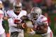 EVANSTON, IL - OCTOBER 05: Braxton Miller #5 of the Ohio State Buckeyes hands off to Carlos Hyde #34 against the Northwestern Wildcats at Ryan Field on October 5, 2013 in Evanston, Illinois. Ohio State defeated Northwestern 40-30. Photo by Jonathan Daniel