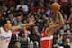 January 19, 2013; Los Angeles, CA, USA; Los Angeles Clippers small forward Matt Barnes (22) guards a 3-point shot by Washington Wizards small forward Trevor Ariza (1) in the second half of the game at the Staples Center. Clippers won 94-87. Mandatory C