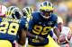 ANN ARBOR, MI - NOVEMBER 09: Devin Gardner #98 of the Michigan Wolverines hands the ball off to Fitzgerald Toussaint #28 of the Michigan Wolverines in the first quarter against the Nebraska Cornhuskers at Michigan Stadium on November 9, 2013 in Ann Arbor