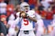 INDIANAPOLIS, IN - DECEMBER 07: Braxton Miller #5 of the Ohio State Buckeyes throws a pass before the Big Ten Championship against the Michigan State Spartans at Lucas Oil Stadium on December 7, 2013 in Indianapolis, Indiana. (Photo by Andy Lyons/Getty