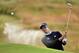HOYLAKE, ENGLAND - JULY 14: Adam Scott of Australia hits from a bunker during a practice round prior to the start of the 143rd Open Championship at Royal Liverpool on July 14, 2014 in Hoylake, England. (Photo by Stuart Franklin/Getty Images)