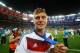 RIO DE JANEIRO, BRAZIL - JULY 13: Toni Kroos of Germany celebrates with his medal after defeating Argentina 1-0 in extra time during the 2014 FIFA World Cup Brazil Final match between Germany and Argentina at Maracana on July 13, 2014 in Rio de Janeiro, B