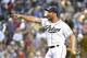 SAN DIEGO, CA - JUNE 4: Huston Street #16 of the San Diego Padres points after striking out Russell Martin #55 of the Pittsburgh Pirates for the final out during the ninth inning of a baseball game at Petco Park June 4, 2014 in San Diego, California. (P