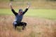 HOYLAKE, ENGLAND - JULY 15: Rory McIlroy of Northern Ireland stretches during a practice round prior to the start of The 143rd Open Championship at Royal Liverpool on July 15, 2014 in Hoylake, England. (Photo by Tom Pennington/Getty Images)