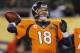 EAST RUTHERFORD, NJ - FEBRUARY 02: Quarterback Peyton Manning #18 of the Denver Broncos looks to pass against the Seattle Seahawks during Super Bowl XLVIII at MetLife Stadium on February 2, 2014 in East Rutherford, New Jersey. (Photo by Kevin C. Cox/Get