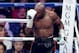LAS VEGAS, NV - MAY 03: Floyd Mayweather Jr. holds his head after he is cut against Marcos Maidana during their WBC/WBA welterweight unification fight at the MGM Grand Garden Arena on May 3, 2014 in Las Vegas, Nevada. (Photo by Ethan Miller/Getty Images