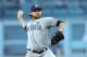 LOS ANGELES, CA - JULY 12: Ian Kennedy #22 of the San Diego Padres throws a pitch against the Los Angeles Dodgers at Dodger Stadium on July 12, 2014 in Los Angeles, California. (Photo by Stephen Dunn/Getty Images)