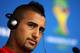 SAO PAULO, BRAZIL - JUNE 22: Arturo Vidal listens to a question during the Chile Press Conference at the 2014 FIFA World Cup Brazil held at the Arena de Sao Paulo on June 22, 2014 in Sao Paulo, Brazil. (Photo by Dean Mouhtaropoulos/Getty Images)