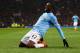 MANCHESTER, ENGLAND - MARCH 25: Yaya Toure of Manchester City celebrates scoring the third goal during the Barclays Premier League match between Manchester United and Manchester City at Old Trafford on March 25, 2014 in Manchester, England. (Photo by Al