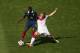 RIO DE JANEIRO, BRAZIL - JULY 04: Bastian Schweinsteiger of Germany challenges Paul Pogba of France during the 2014 FIFA World Cup Brazil Quarter Final match between France and Germany at Maracana on July 4, 2014 in Rio de Janeiro, Brazil. (Photo by Cli
