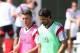 SANTO ANDRE, BRAZIL - JUNE 09: Mesut Oezil (L) talks to team mate Sami Khedira during the German National team training session at Campo Bahia on June 9, 2014 in Santo Andre, Brazil. (Photo by Martin Rose/Getty Images)