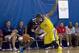 Jul 13, 2013; North Augusta, SC, USA; Jackson Tigers player Malik Newman (12) fouls Boo Williams player Marc Evans (11) during the Nike Peach Jam at the Riverview Park Activities Center. Mandatory Credit: Joshua S. Kelly-USA TODAY Sports