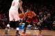 NEW YORK, NY - JANUARY 30: Kyrie Irving #2 of the Cleveland Cavaliers plays defense against J.R. Smith #8 of the New York Knicks during a game at Madison Square Garden in New York City on January 30, 2014. NOTE TO USER: User expressly acknowledges and ag