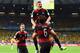 BELO HORIZONTE, BRAZIL - JULY 08: Toni Kroos of Germany celebrates scoring his team's fourth goal with teammates Miroslav Klose (L) and Sami Khedira during the 2014 FIFA World Cup Brazil Semi Final match between Brazil and Germany at Estadio Mineirao on J