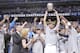 DALLAS, TX - MAY 25: Dirk Nowitzki #41 holds up the trophy in celebration with owner Mark Cuban and the Dallas Mavericks as they celebrate their victory against the Oklahoma City Thunder during Game Five of the Western Conference Finals in the 2011 NBA Pl