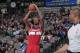 DALLAS, TX - NOVEMBER 12: Trevor Ariza #1 of the Washington Wizards shoots the ball against the Dallas Mavericks on November 12, 2013 at the American Airlines Center in Dallas, Texas. NOTE TO USER: User expressly acknowledges and agrees that, by download