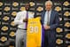 EL SEGUNDO, CA - JUNE 30: Julius Randle #30 of the Los Angeles Lakers poses for a photo with Los Angeles Lakers General Manager Mitch Kupchak during his introductory press conference on June 30, 2014 at the Toyota Sports Center in El Segundo, California.