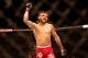 Jul 16, 2014; Atlantic City, NJ, USA; John Lineker shows he is number one after a flyweight bout at Revel Casino. Mandatory Credit: Bill Streicher-USA TODAY Sports