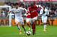 SWANSEA, WALES - MARCH 16: Abou Diaby of Arsenal battles with Ki Sung-Yueng of Swansea City during the Barclays Premier League match between Swansea City and Arsenal at Liberty Stadium on March 16, 2013 in Swansea, Wales. (Photo by Jan Kruger/Getty Ima