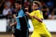 HIGH WYCOMBE, ENGLAND - JULY 16: Marco van Ginkel of Chelsea battles with Aaron Pierre of Wycombe duing the pre season friendly match between Wycombe Wanderers and Chelsea at Adams Park on July 16, 2014 in High Wycombe, England. (Photo by Ben Hoskins/Get