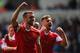 SWANSEA, WALES - MAY 03: Rickie Lambert of Southampton celebrates with Luke Shaw (R) as he scores their first goal during the Barclays Premier League match between Swansea City and Southampton at Liberty Stadium on May 3, 2014 in Swansea, Wales. (Photo