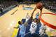MEMPHIS, TN - DECEMBER 28: Ed Davis #32 of the Memphis Grizzlies dunks against the Denver Nuggets on December 28, 2013 at FedExForum in Memphis, Tennessee. NOTE TO USER: User expressly acknowledges and agrees that, by downloading and or using this photogr