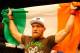 BOSTON, MA - AUGUST 17: Conor McGregor celebrates following his win against Max Holloway in their featherweight bout at TD Garden on August 17, 2013 in Boston, Massachusetts. (Photo by Jared Wickerham/Getty Images)